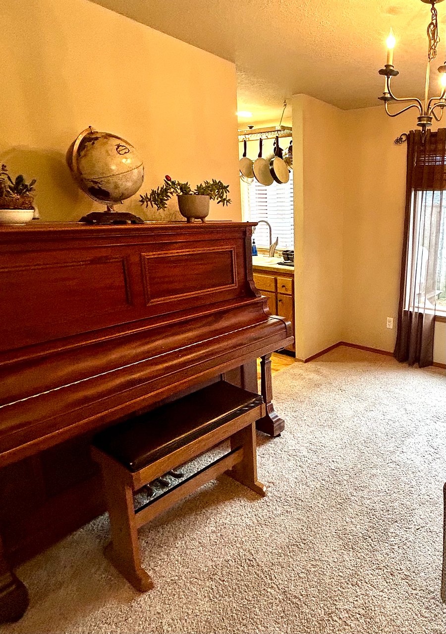Piano Room leads into Full Kitchen