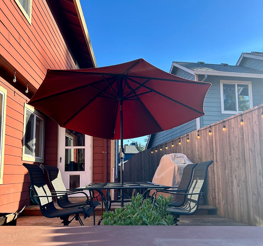 Private Backyard with BBQ Grill and Outdoor Dining