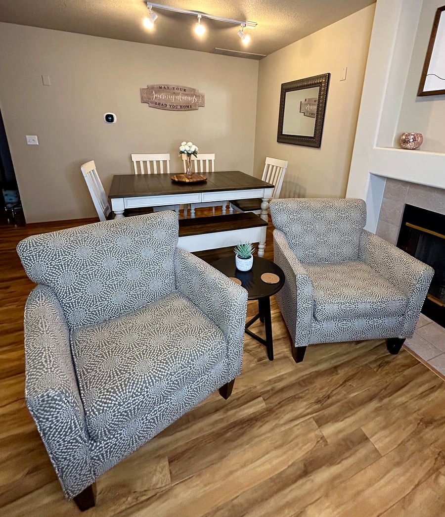 TV Seating Area with Dining Table in Background