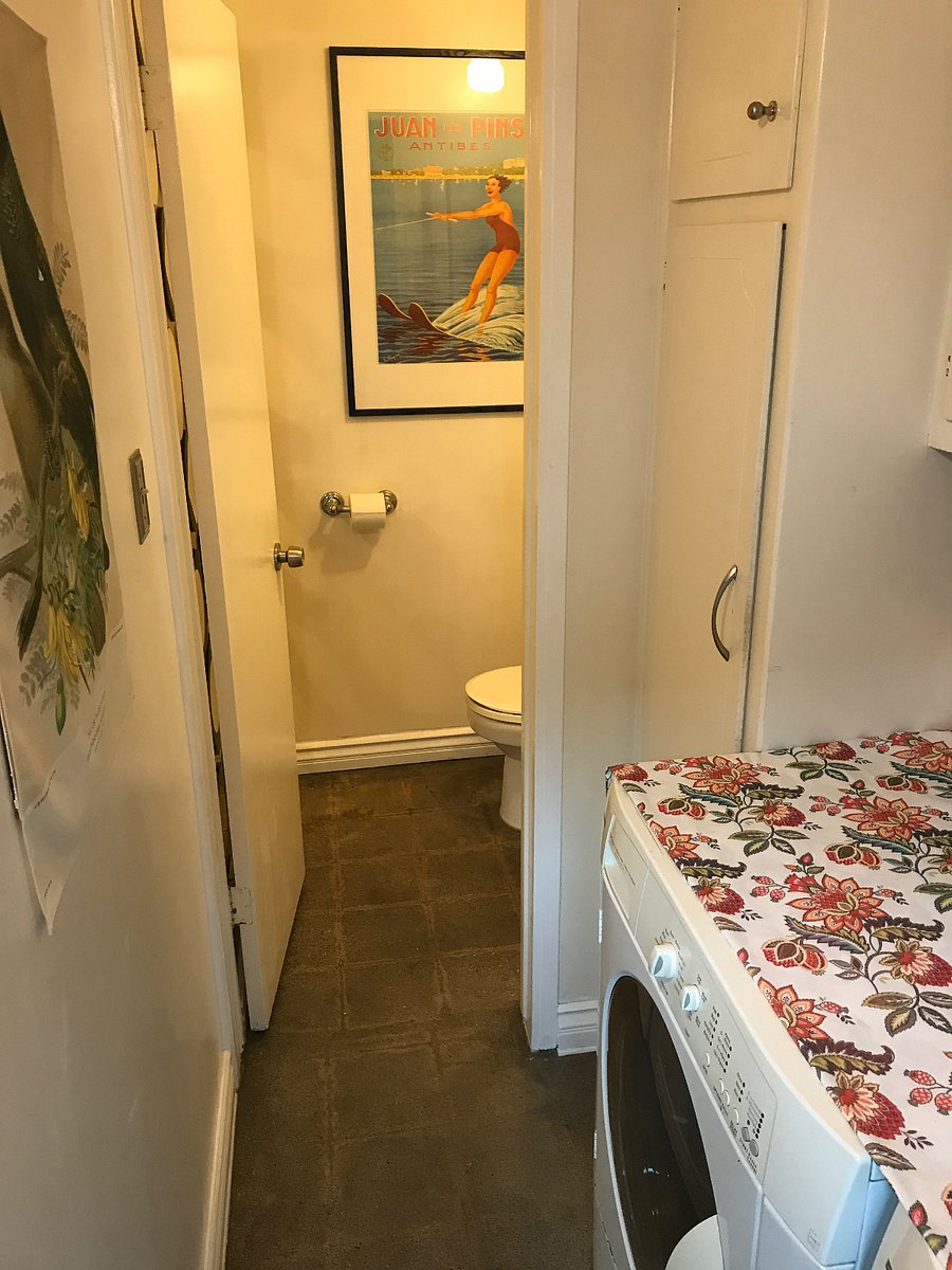 Washer/dryer leading to half bath