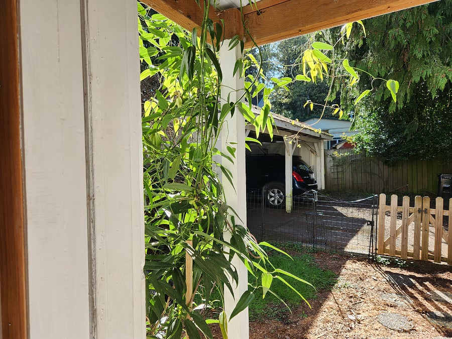 The carport is steps away from the entrance.