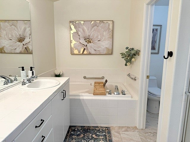 Primary Master Bathroom - Bath Tub + Toilet Room