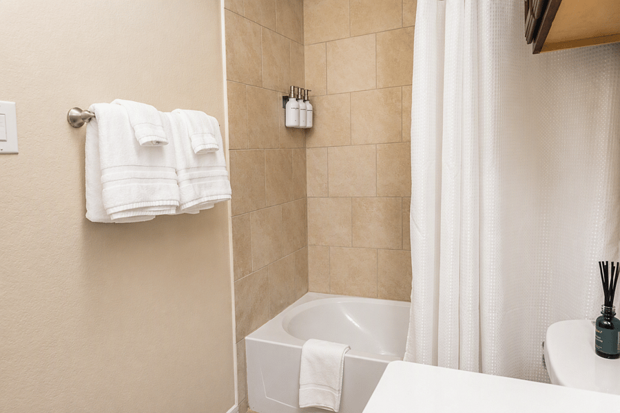 Clean, comfortable bathroom with everyday essentials.