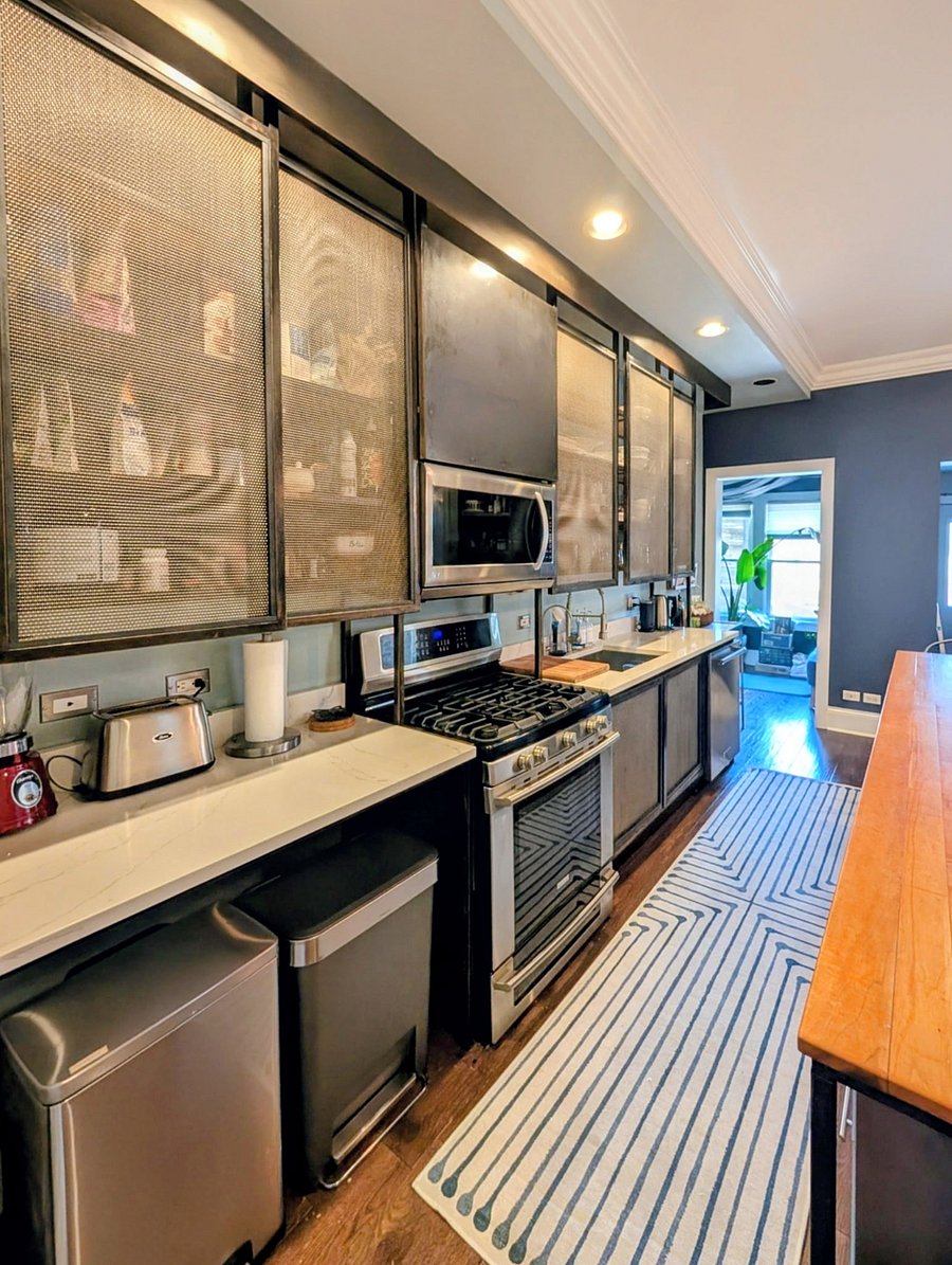 Industrial kitchen, smart storage throughout and fully equipped with all kitchen necessities.