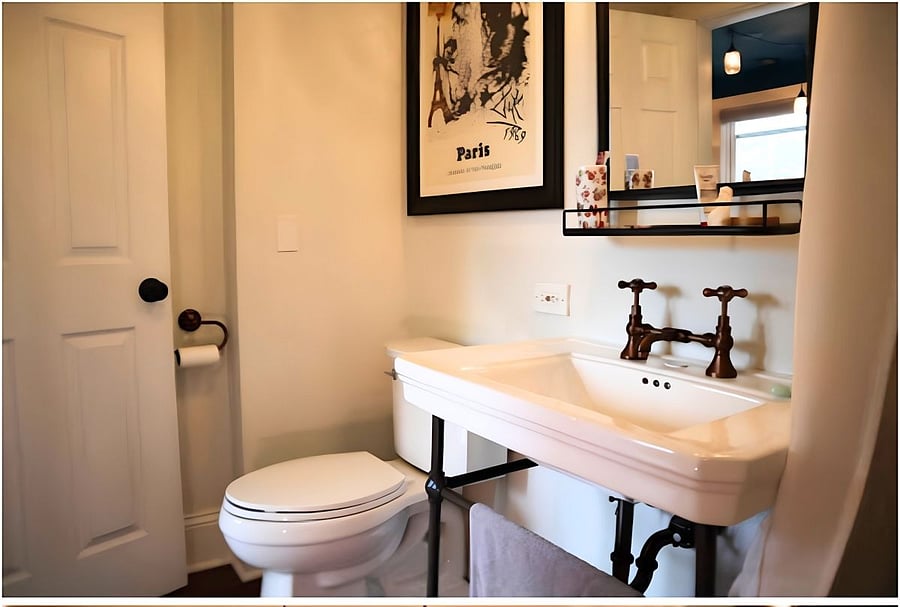 Full bathroom downstairs. Not in photo- full shower & bathtub.