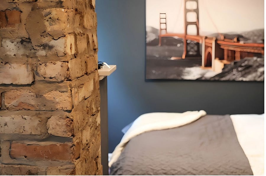 Natural elements throughout the home such as brick, wood, and tiling to reflect the time period.