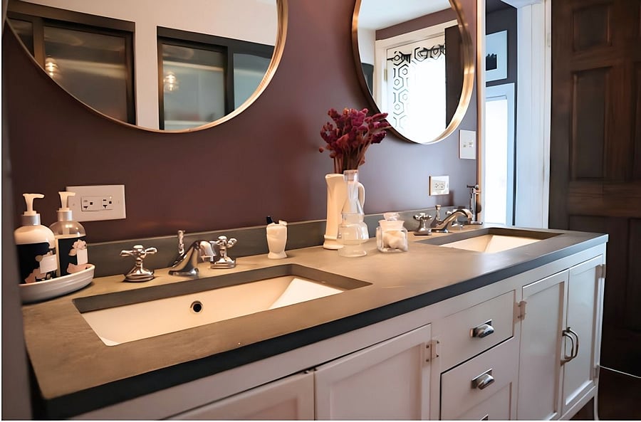 Double vanity sinks with granite countertops.