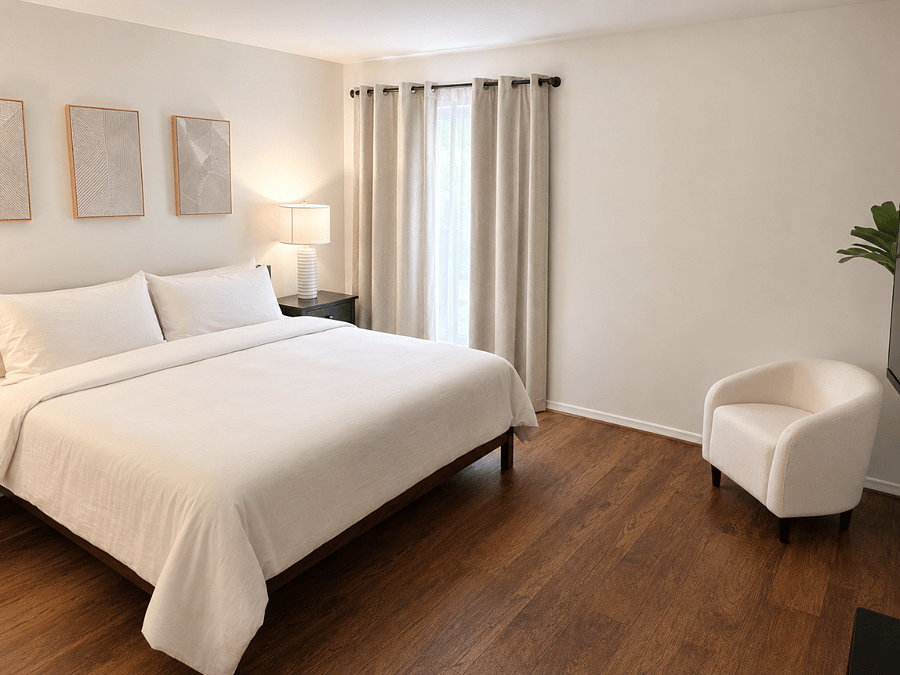 Spacious primary bedroom with comfy king bed-tv-private bathroom and walk in closet.