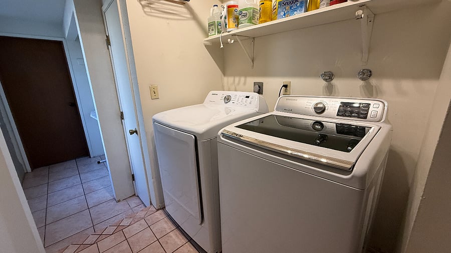 A washer and Dryer in the hallway off the the family room.