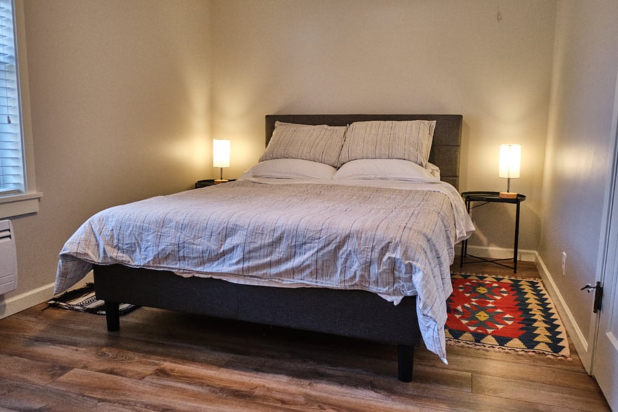 Bedroom with north-facing window and a work space