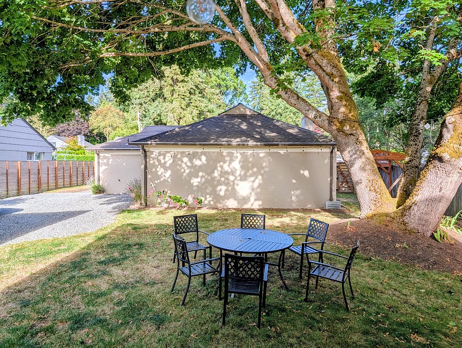 A secluded back yard for grilling and dining under tree shade in the summer, or simply unplug and enjoy a good book.