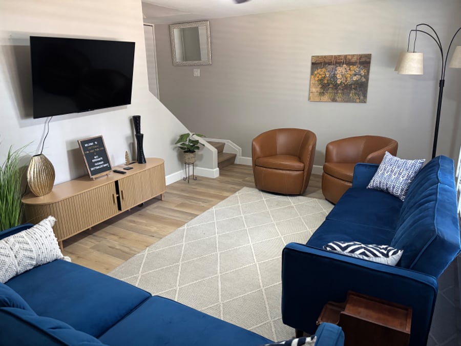 Large open family room with 55" smart tv.