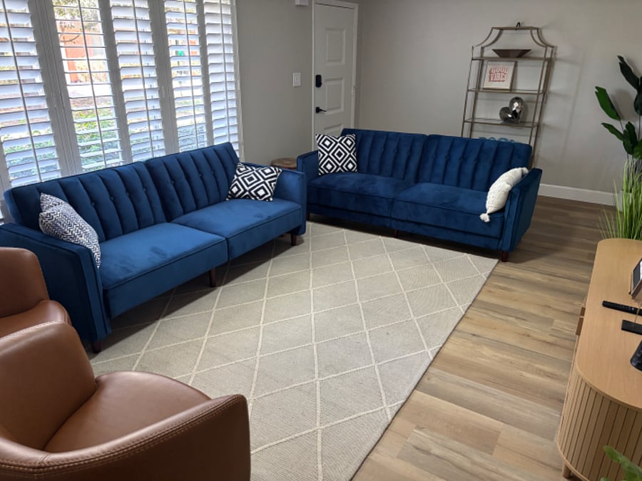 Large open family room with 55" smart tv.
