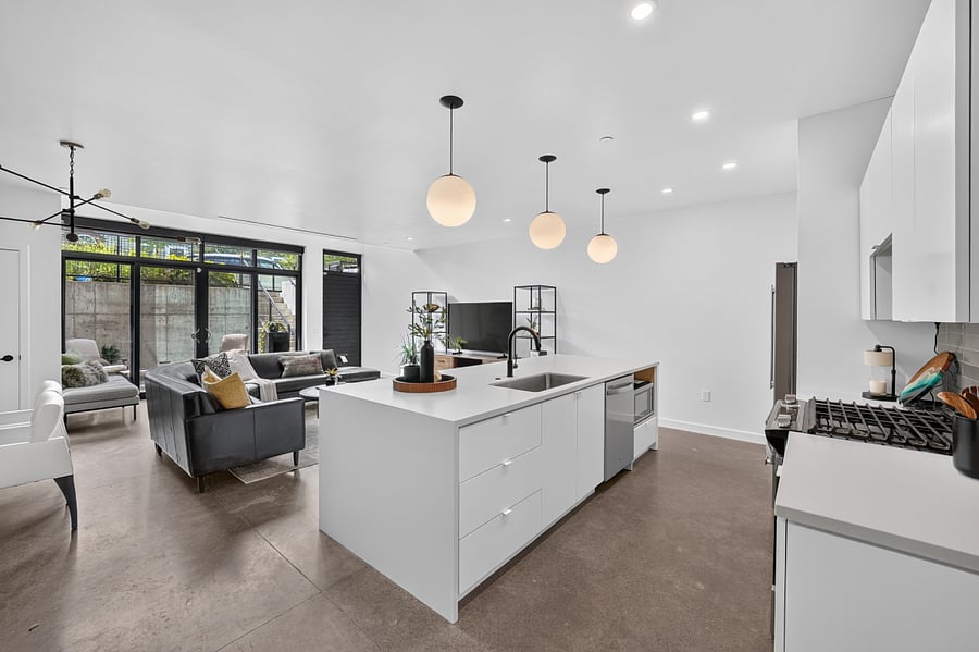 Kitchen island with storage, dishwasher and microwave.