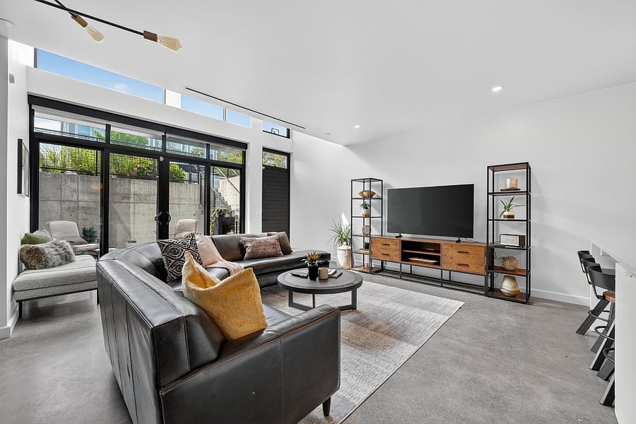 Living room area (1st floor) with 65" Samsung smart TV.