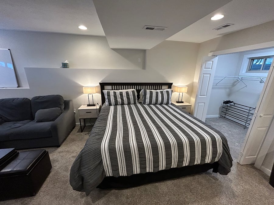Large Room with Sitting area, desk, private bathand walkin closet. 
