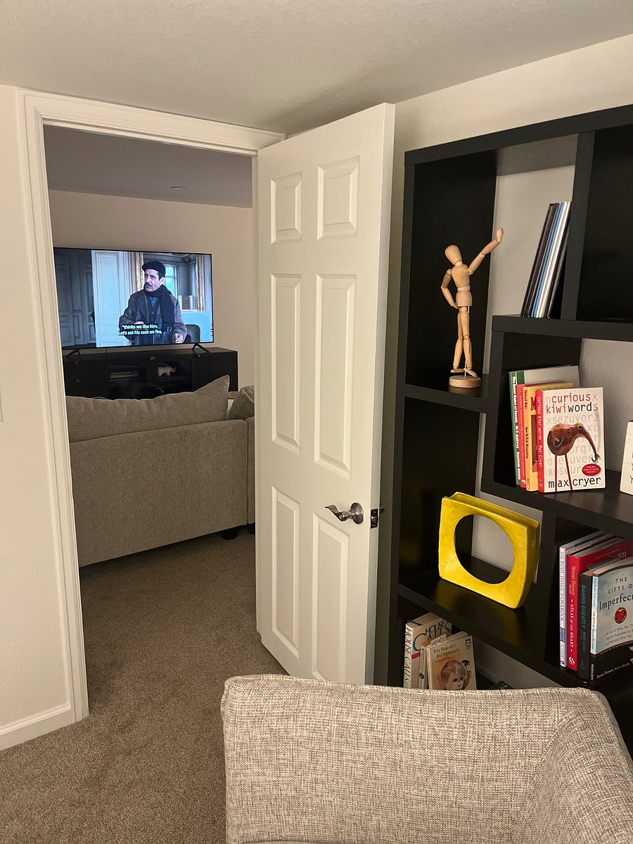 Downstairs Bedroom with view of family room