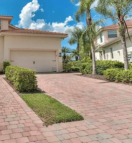 Driveway.  Space for up two 3 cars.  Walkway to main entrance of  home.