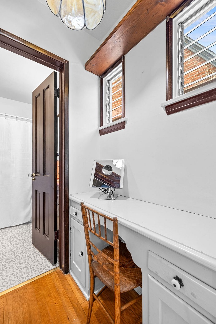 Vanity off primary bedroom that is also connected to full bath.