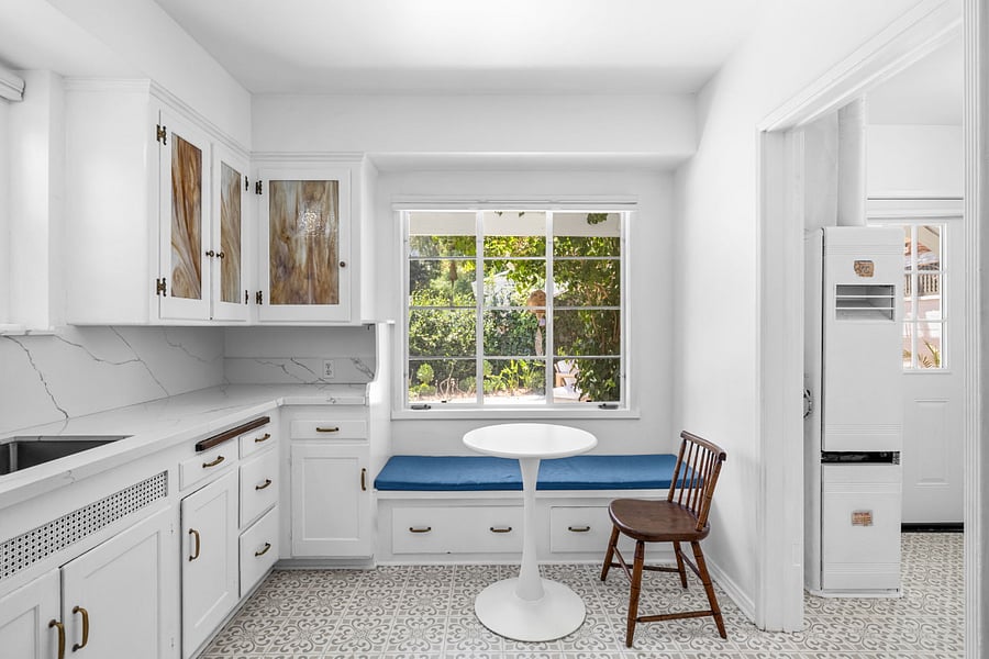 Kitchen window seat overlooking back garden oasis.