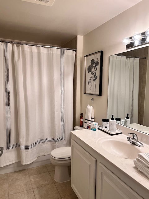 Large bathroom, with tub/shower combination.