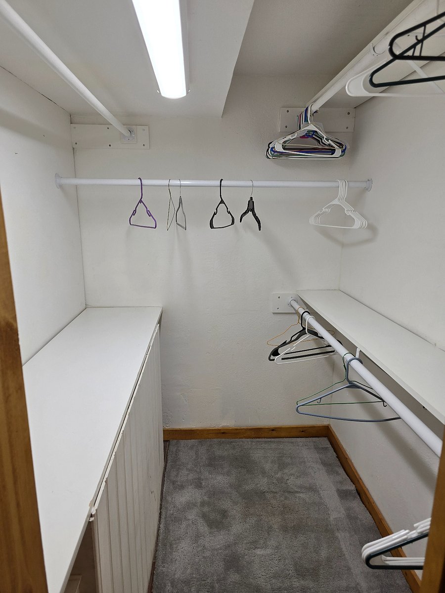 Walk-in closet located between master bedroom and Bathroom