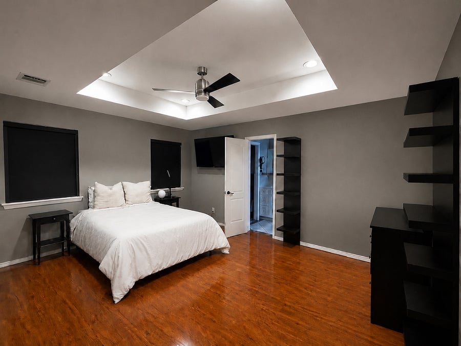 Master bed room with door to covered patio