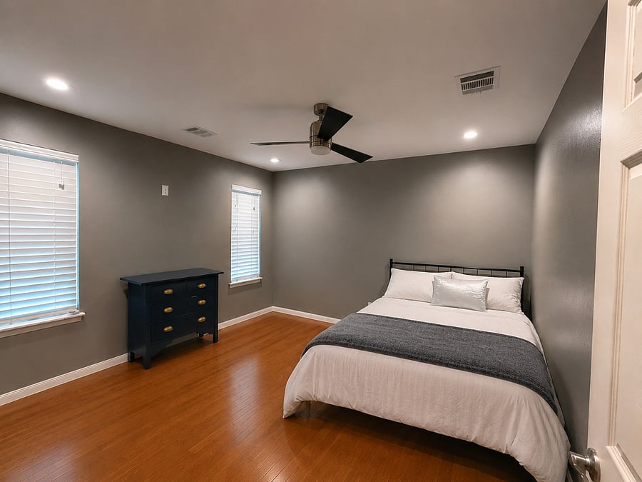 Bedroom #3 with twin bed, nightstand and walk in closet