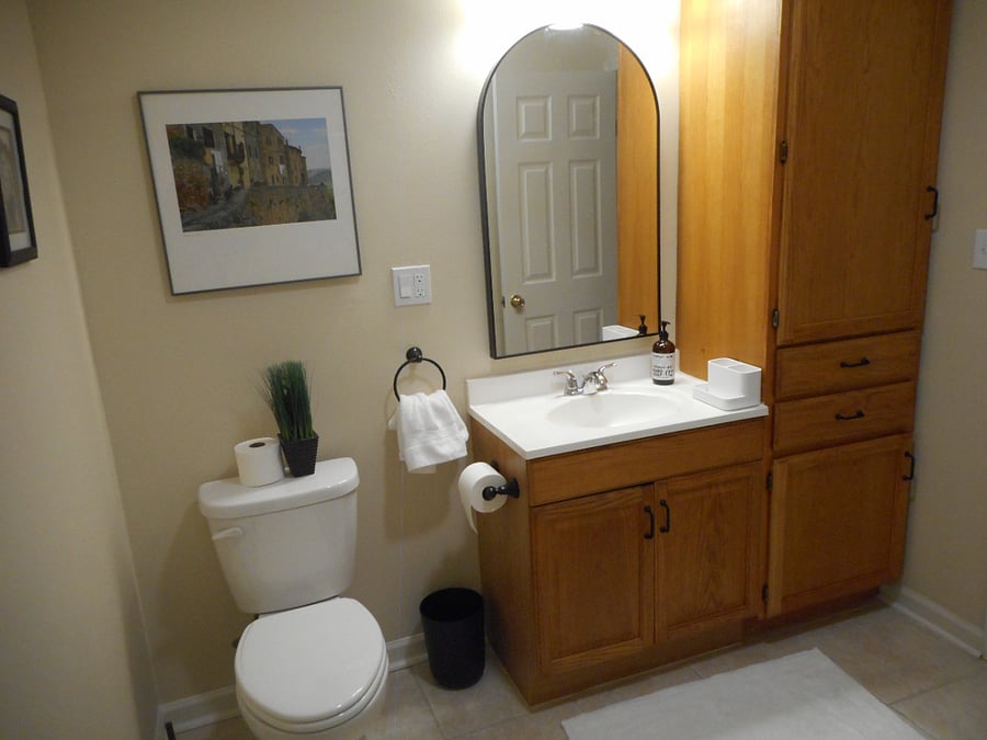 Roomy bathroom with lots of accessible storage.