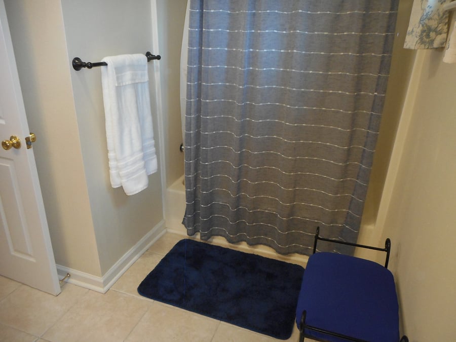 Tub with shower.
