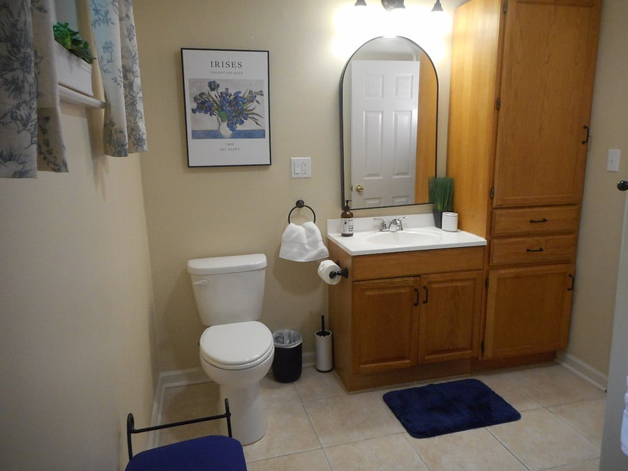 Very roomy and fresh! Plenty of cabinet storage in bathroom.