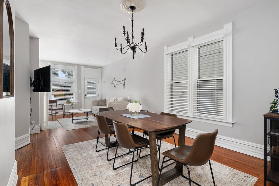Gather around the dining table for meals, games, or conversation