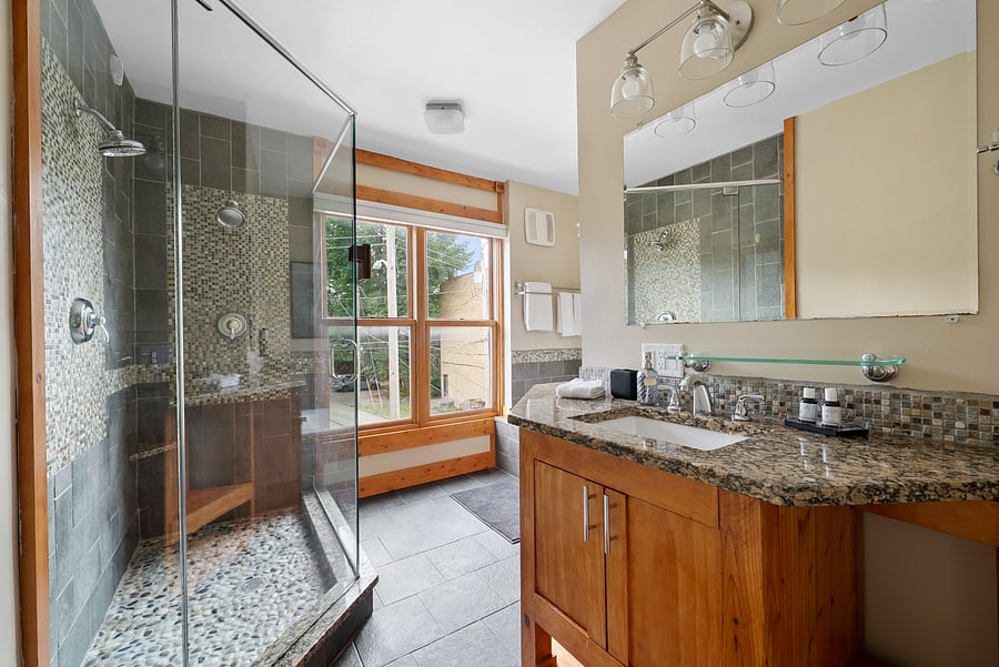 Spacious ensuite bathroom with a double vanity and walk-in shower