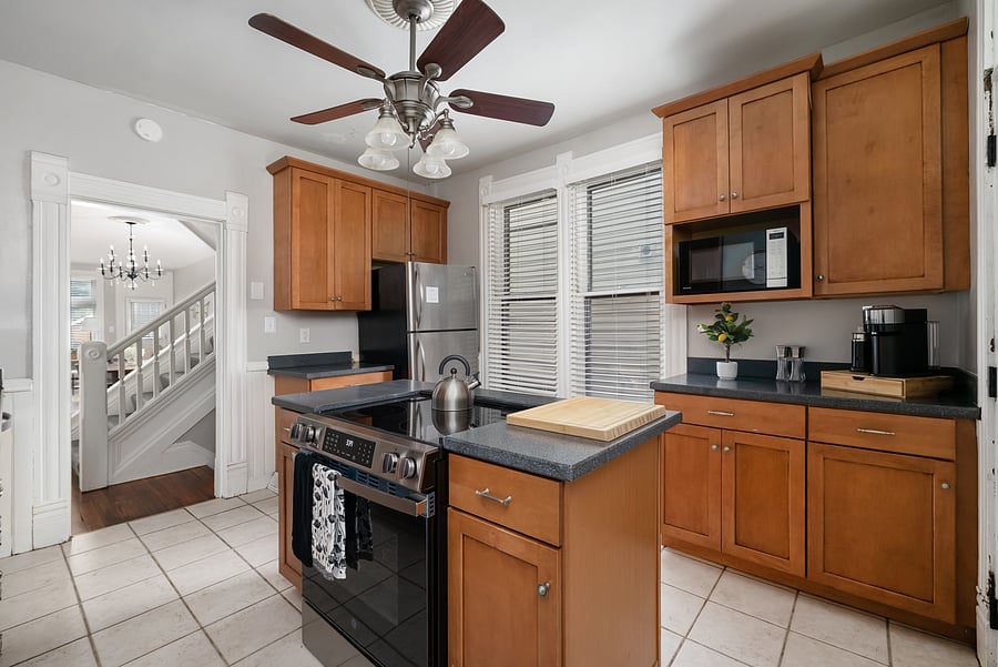 Fully equipped kitchen with stainless-steel appliances and generous prep space