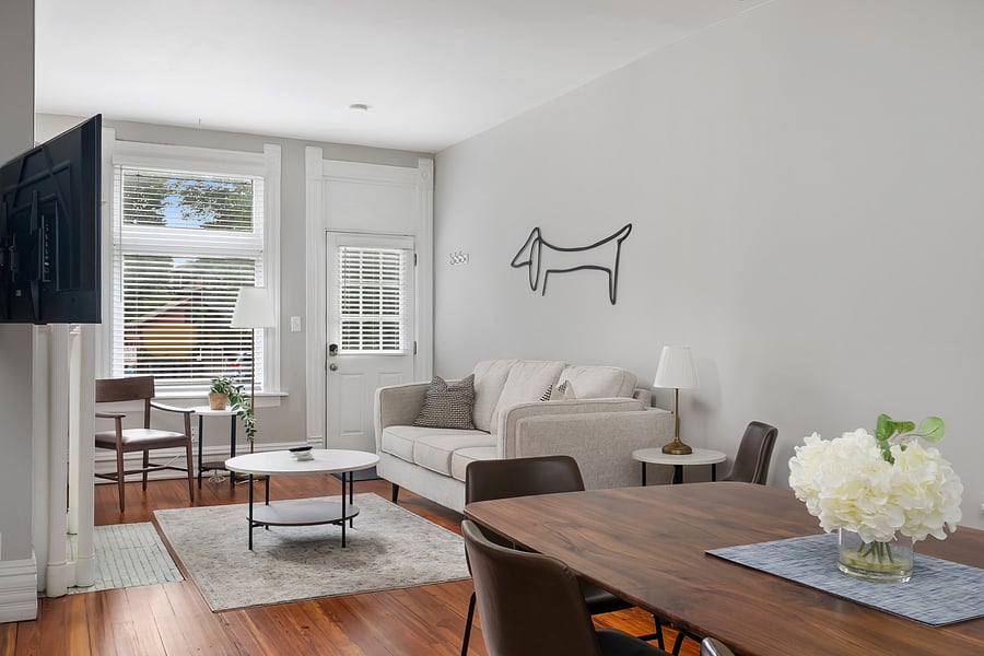 Light-filled living room with comfortable seating for the whole group.