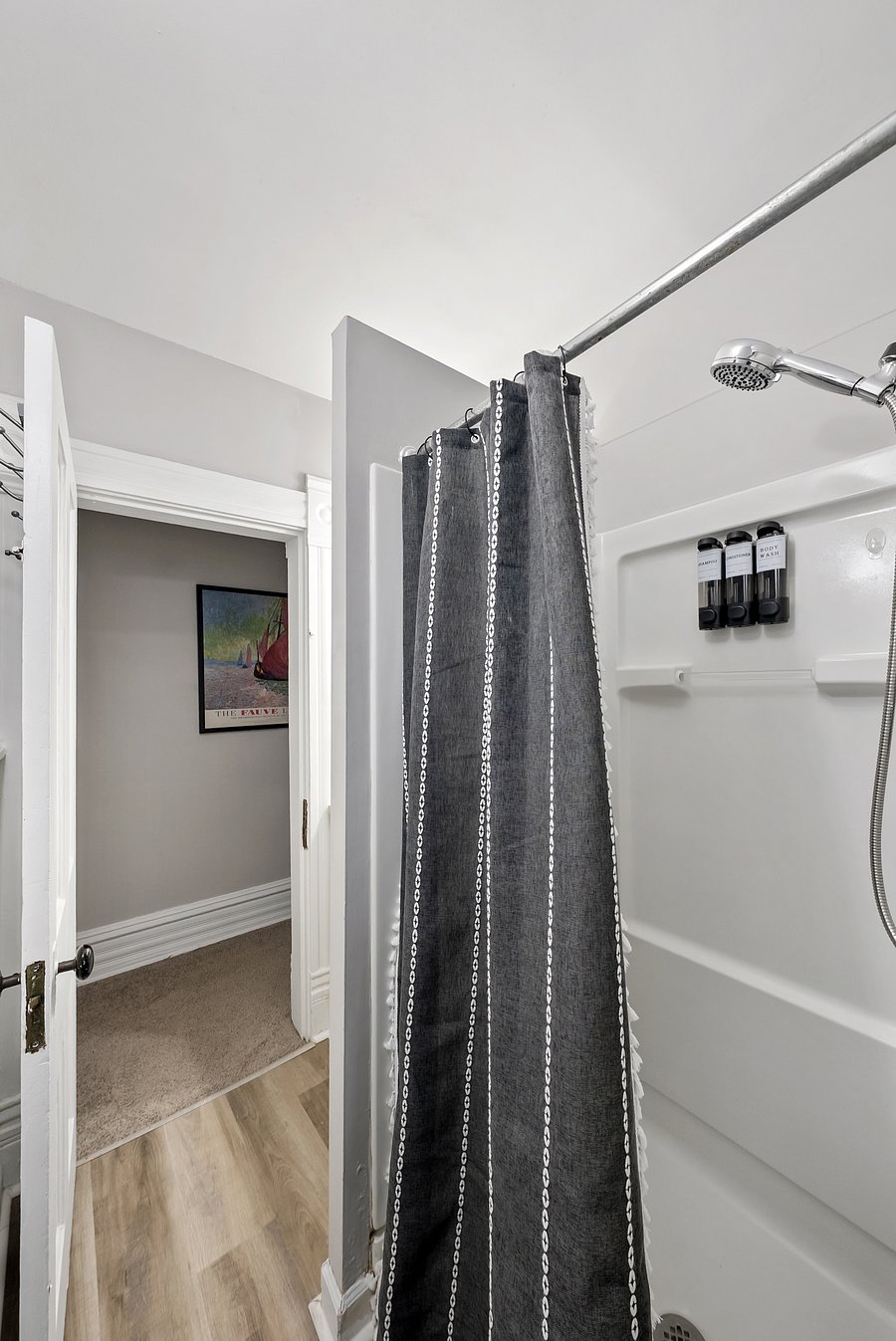 Full bathroom with a vanity and walk-in shower
