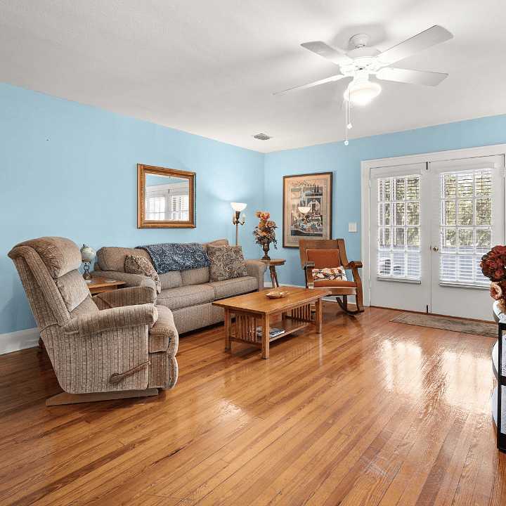 French doors lead to the private screened porch.