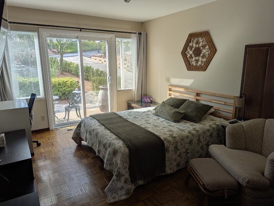 Bedroom 2, with sliding door to the front of the house