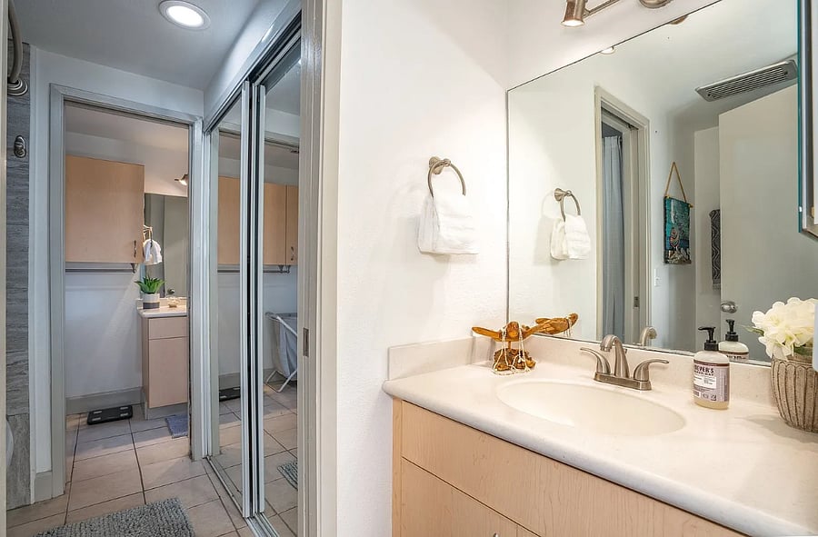 Unit has two toilets. Jack and Jill bathroom. This one is the side on the living room