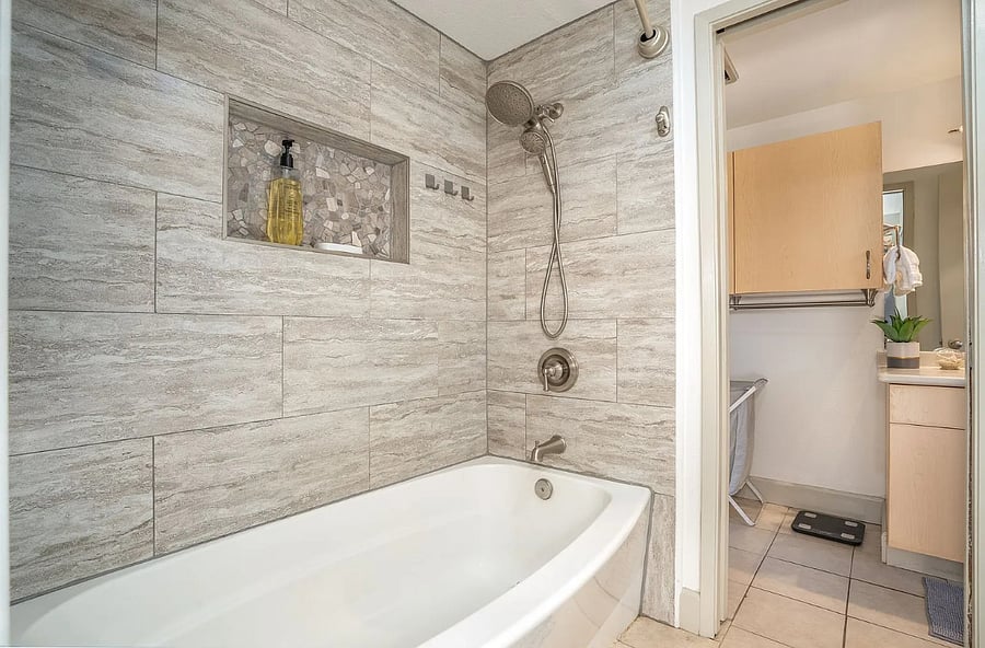 Beautiful shower and tub, plenty of storage and full size mirrors