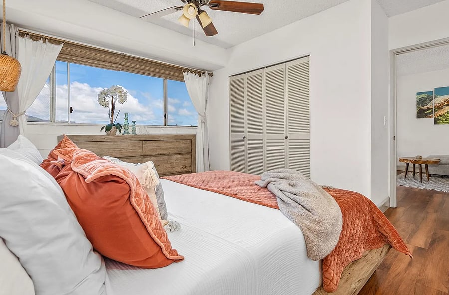 Ceiling fan and AC unit make this room extra comfortable, blackout curtains as well.Secon