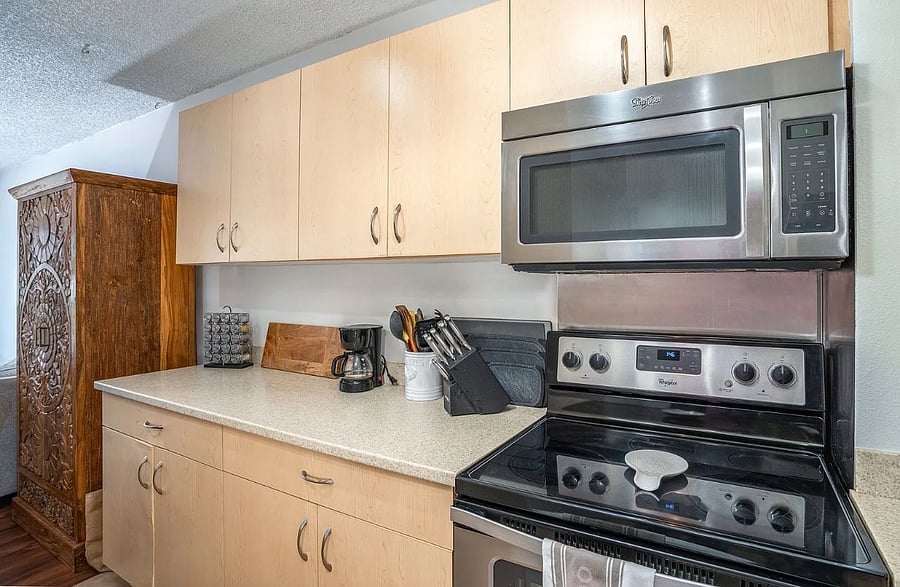 Full size working kitchen.  The only thing we don't have is a dishwasher so keep that in mind.  