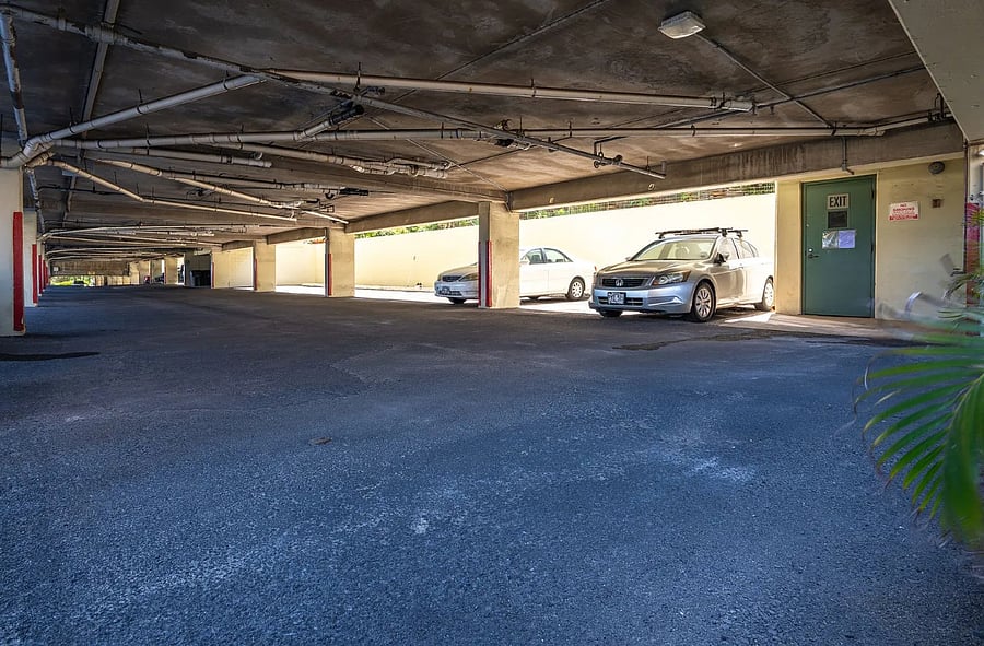 Covered parking garage has many cameras and an onsite manager to keep things safe.  
