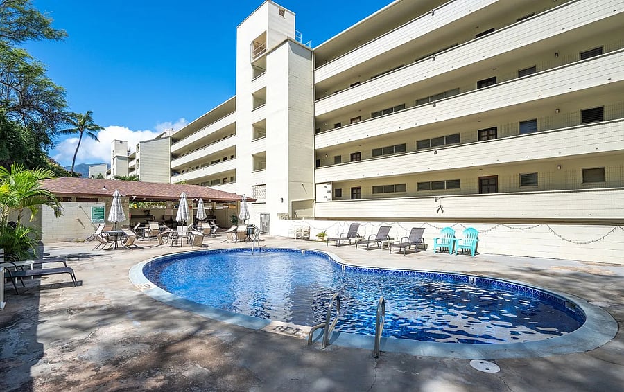 Exterior pool with BBQ grills, tables and a covered pavillion available for you to use.  