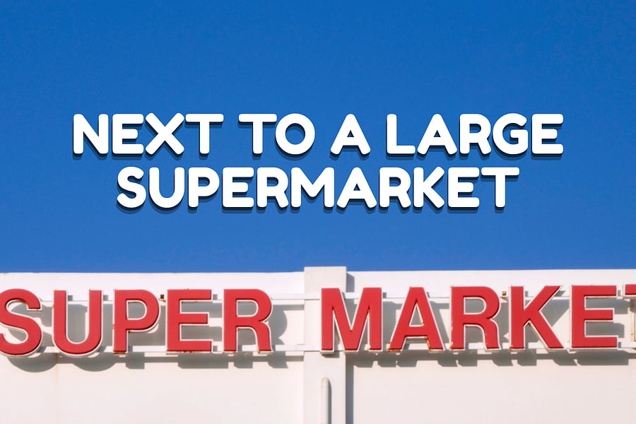 Next to a large supermarket