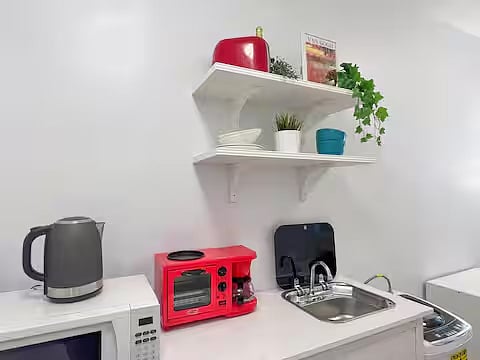Kitchenette with Coffee Maker, Toaster Oven and Microwave