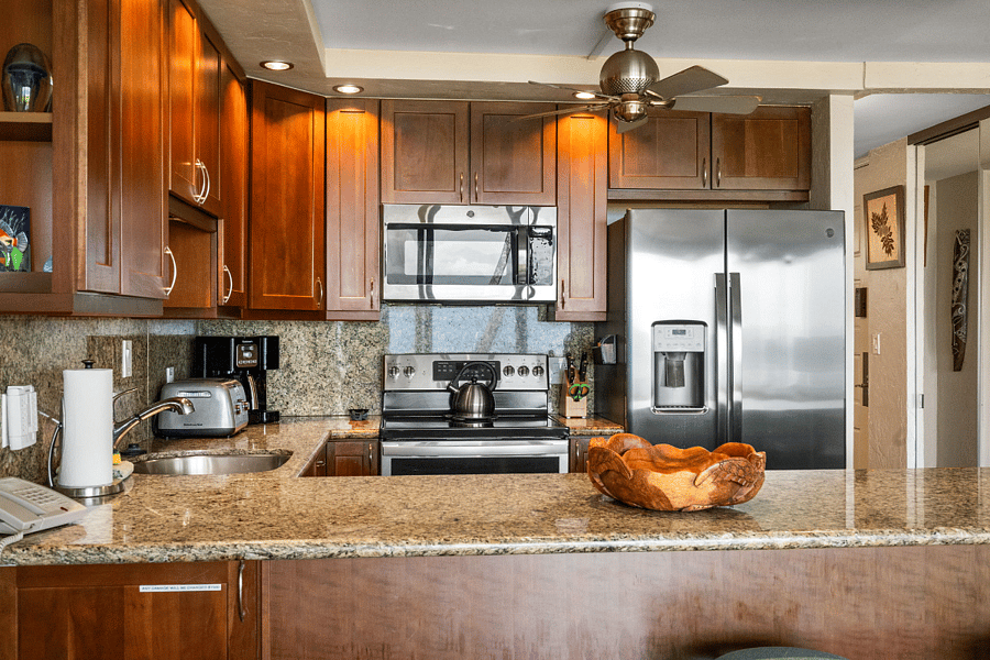 Fully equipped kitchen with full-size appliances, generous counter space, and everything needed for meals at home.