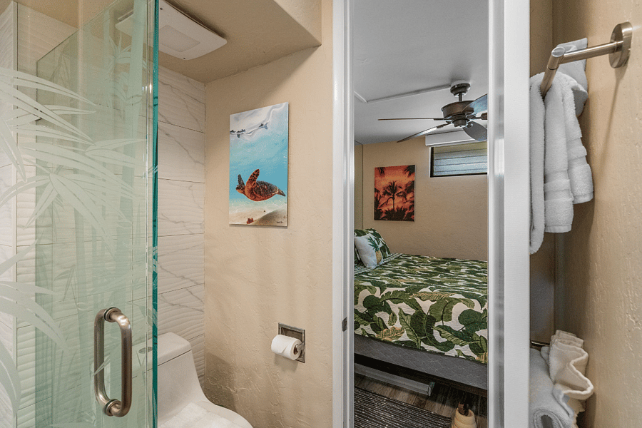 The newly added bathroom door provides convenient private access directly from the bedroom.