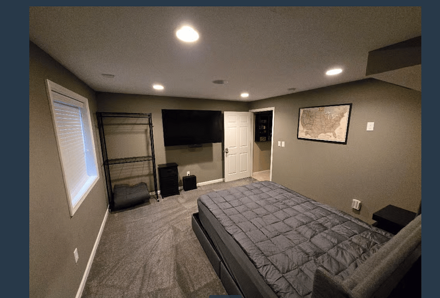 Furnished Bedroom with TV