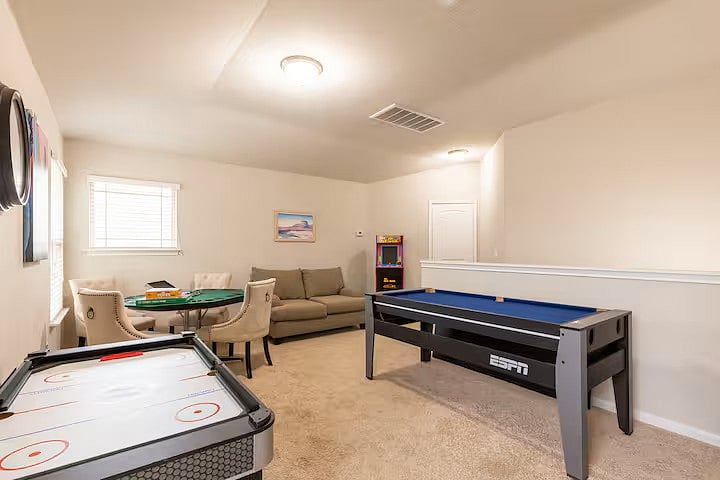 Loft area with games and wall mounted tv
